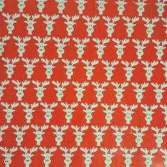 Papier do pakowania prezentów 200x70cm czerwony w renifery